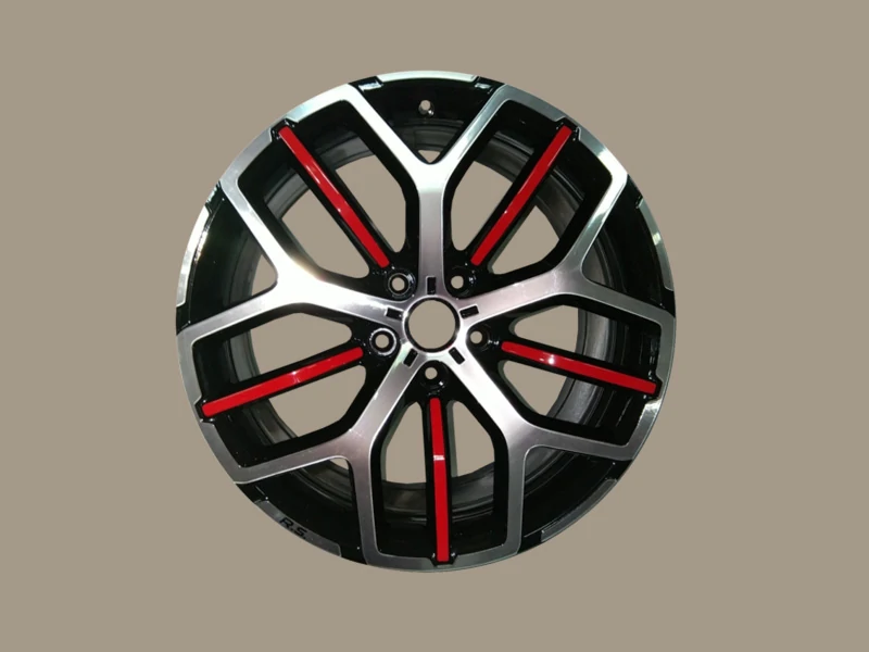Jante de diacia duster refaite à neuf. Couleur argent et rouge vif